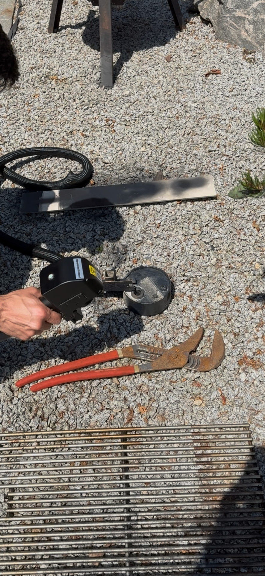 Rusted pliers prepared for laser restoration